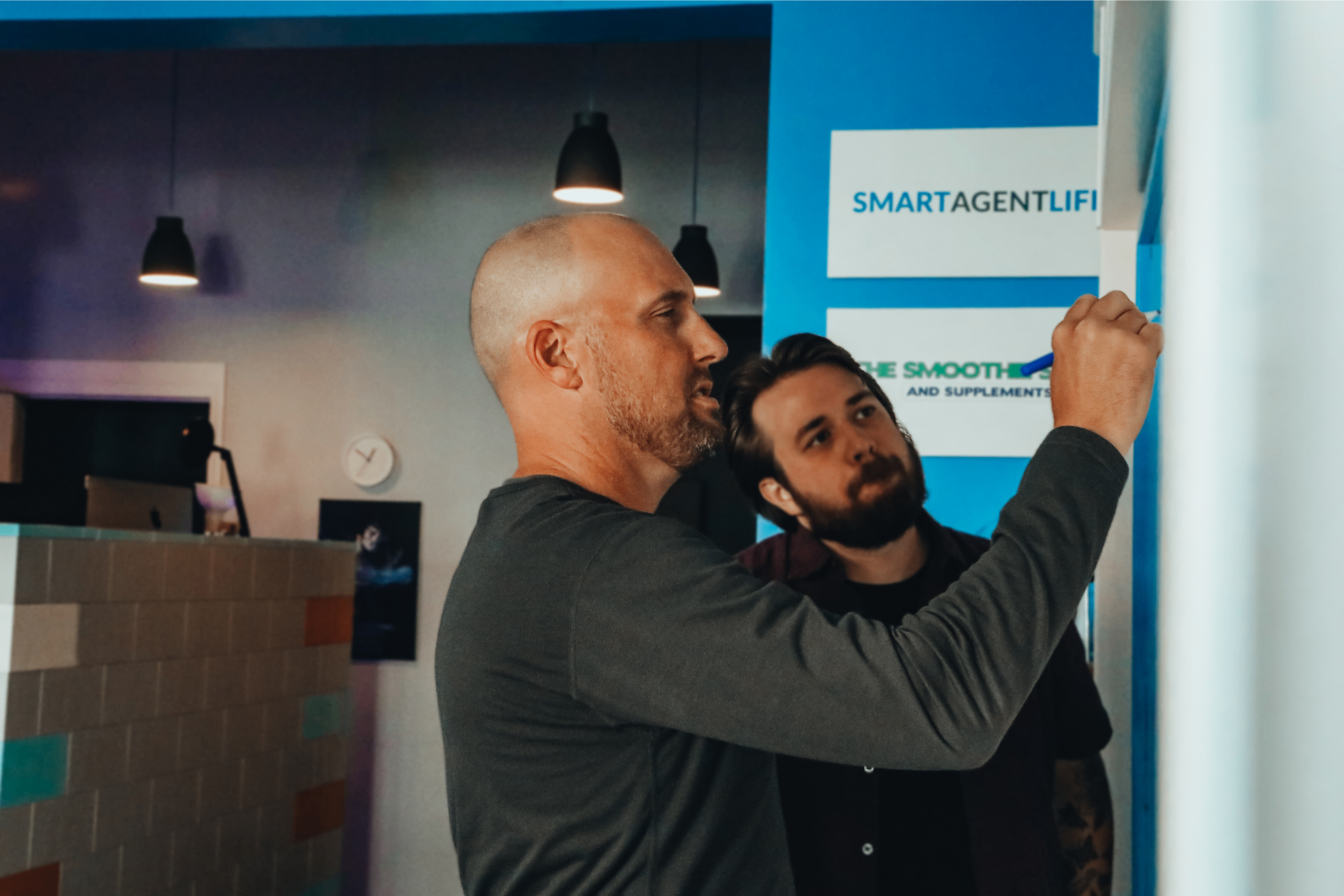 Exit planning strategy session — whiteboard mapping business value drivers